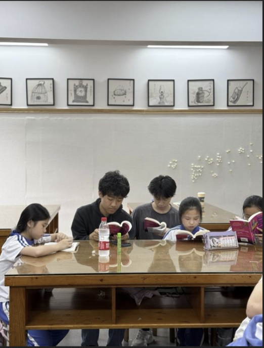 Reading Buddies session at YuCai 3rd Elementary